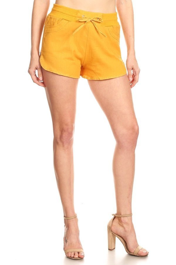 Solid, linen shorts with an elastic waistband, side pockets, and waist tie. - FashionJOA